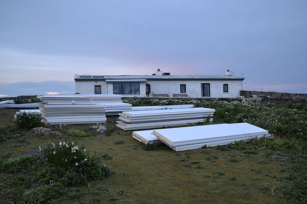 Roof panels sitting outside Observatory building on Saturday evening